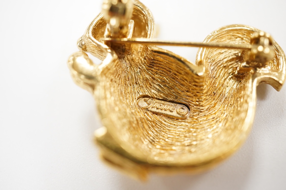 A collection of jewels, comprising: an Art Deco green and colourless paste jabot pin; two shell cameo brooches, depicting a lady in profile, length 4.7cm, stamped 9ct, and Sol's chariot respectively; and a gilt metal and